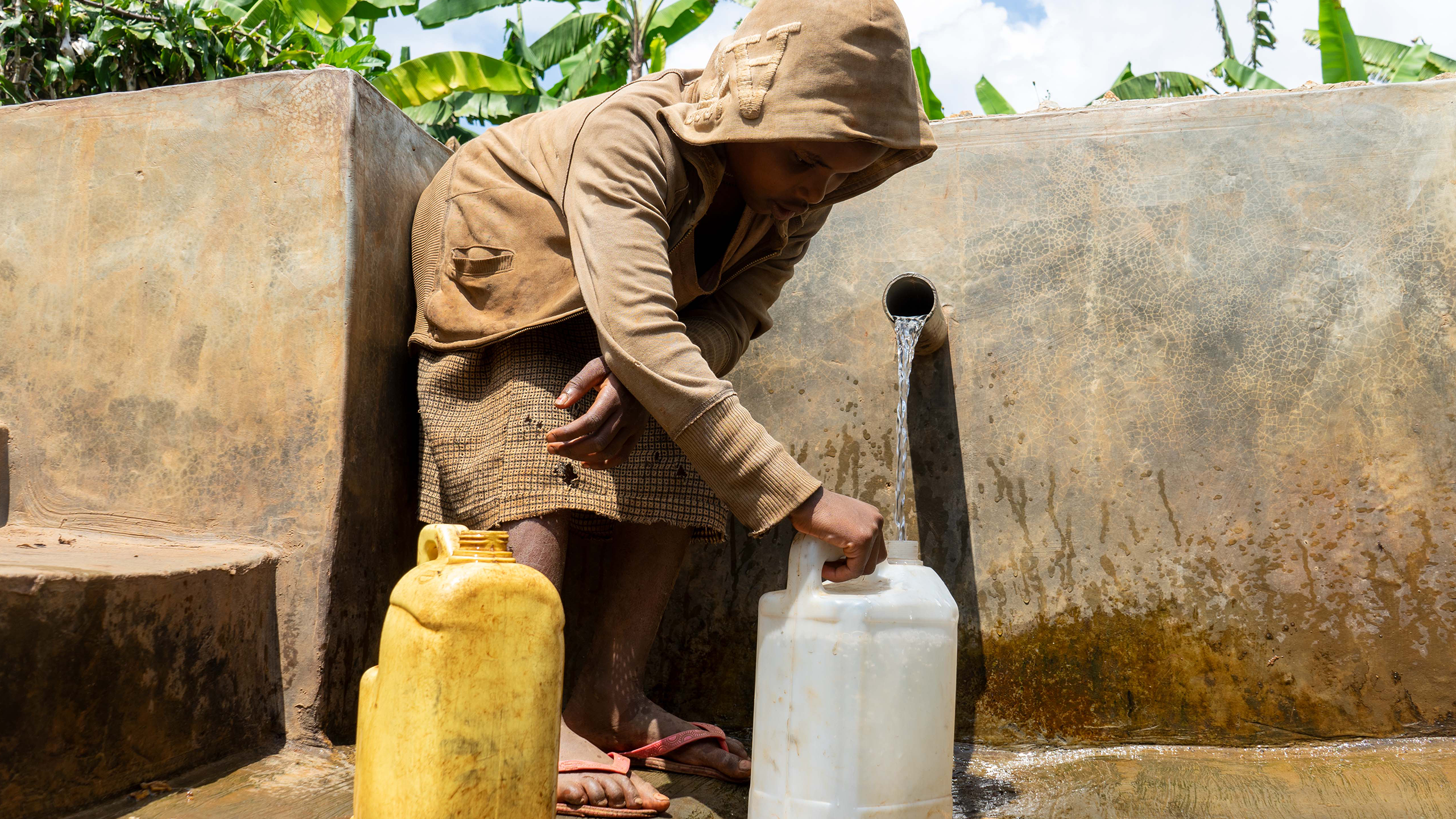 A young girl fetches water in Katungu village Kahoko cluster.